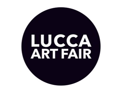 White title "Lucca Art Fair" on black ground in a circle 