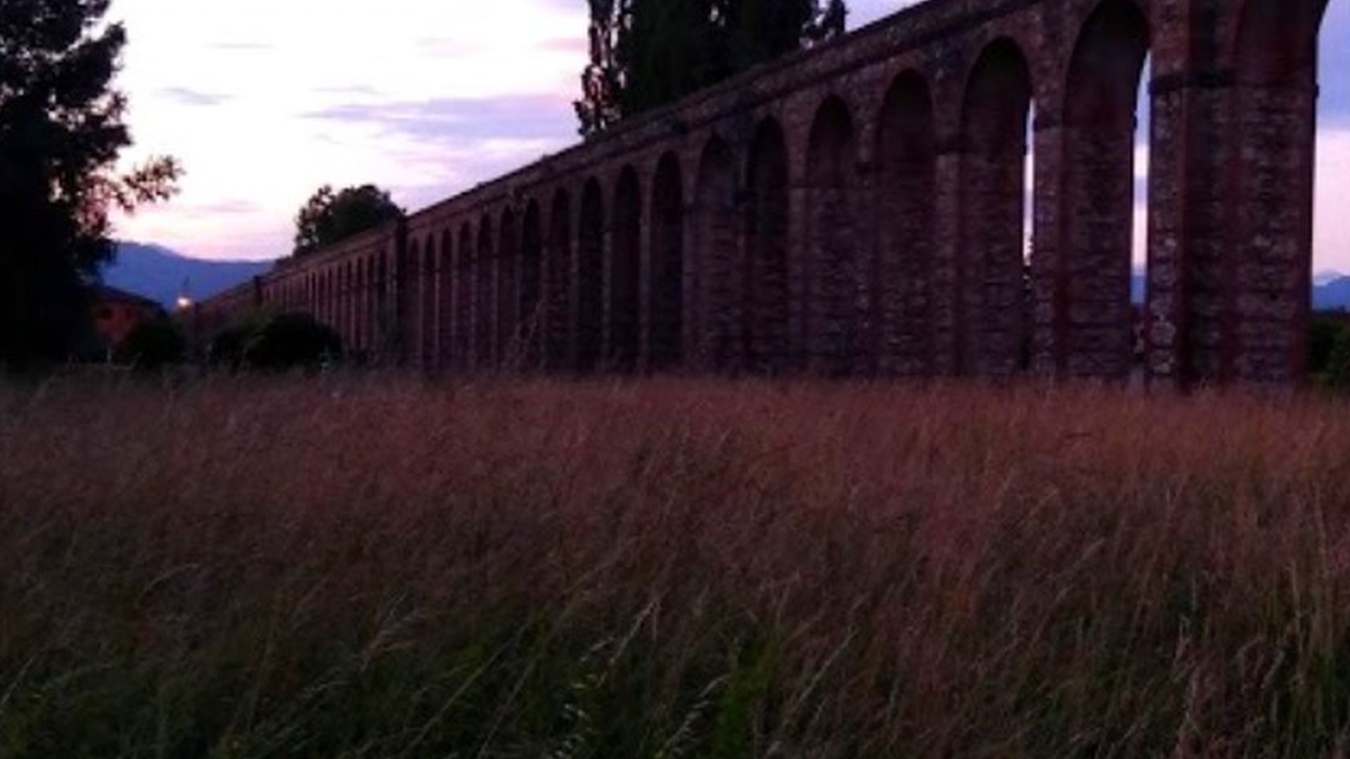 monumental aqueduct in the evening